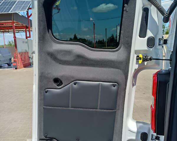Білий Опель Віваро, об'ємом двигуна 2 л та пробігом 153 тис. км за 26500 $, фото 35 на Automoto.ua