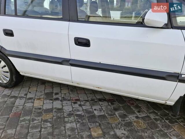 Белый Опель Зафира, объемом двигателя 1.6 л и пробегом 314 тыс. км за 3190 $, фото 7 на Automoto.ua