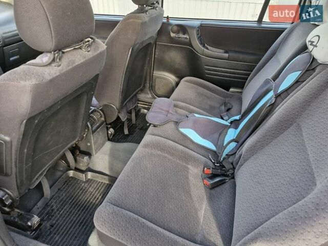 Белый Опель Зафира, объемом двигателя 1.6 л и пробегом 314 тыс. км за 3190 $, фото 11 на Automoto.ua