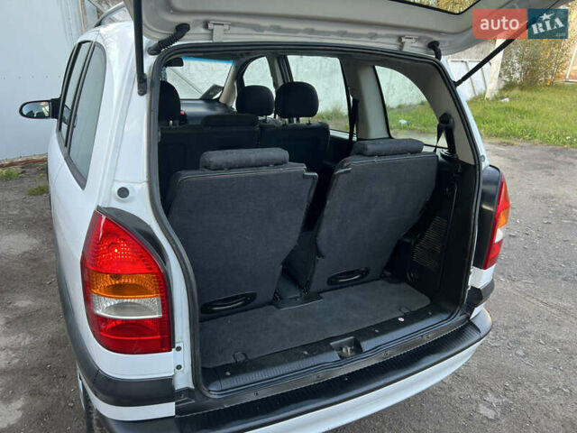 Белый Опель Зафира, объемом двигателя 1.6 л и пробегом 316 тыс. км за 3650 $, фото 41 на Automoto.ua