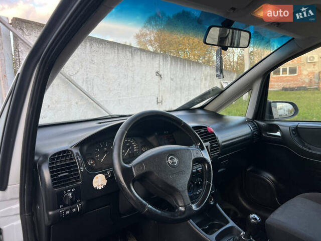 Белый Опель Зафира, объемом двигателя 1.6 л и пробегом 316 тыс. км за 3650 $, фото 28 на Automoto.ua