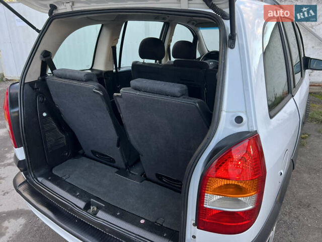 Белый Опель Зафира, объемом двигателя 1.6 л и пробегом 316 тыс. км за 3650 $, фото 42 на Automoto.ua