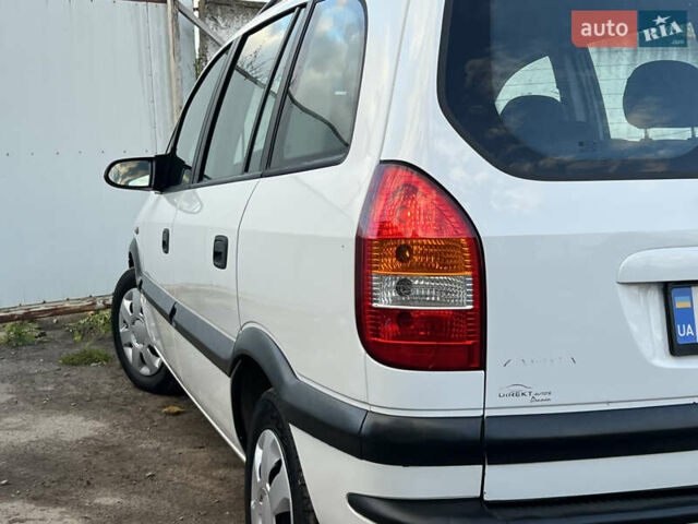 Белый Опель Зафира, объемом двигателя 1.6 л и пробегом 316 тыс. км за 3650 $, фото 21 на Automoto.ua