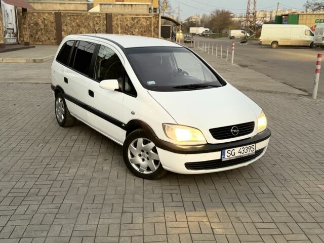 Белый Опель Зафира, объемом двигателя 2 л и пробегом 299 тыс. км за 1999 $, фото 1 на Automoto.ua