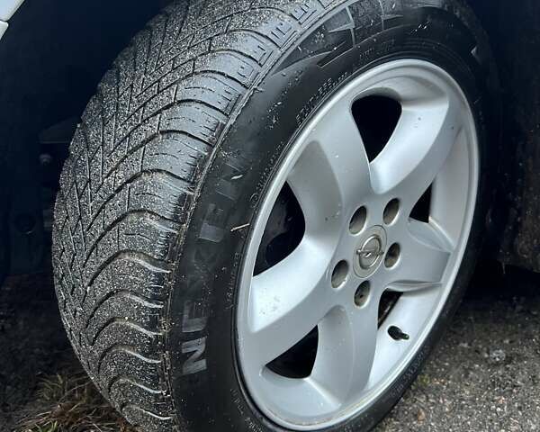 Белый Опель Зафира, объемом двигателя 1.8 л и пробегом 218 тыс. км за 7555 $, фото 38 на Automoto.ua