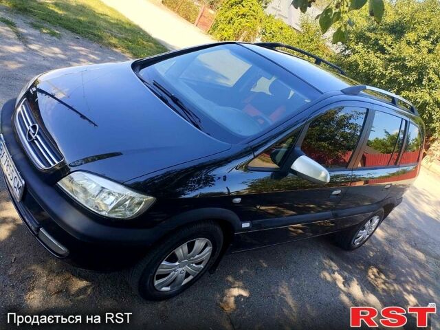 Черный Опель Зафира, объемом двигателя 1.8 л и пробегом 266 тыс. км за 3200 $, фото 6 на Automoto.ua