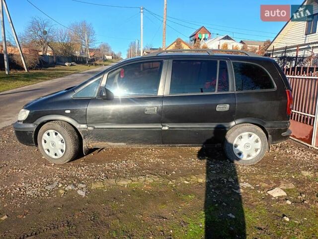 Черный Опель Зафира, объемом двигателя 2 л и пробегом 281 тыс. км за 2700 $, фото 1 на Automoto.ua