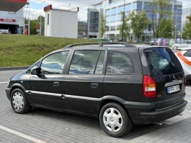Черный Опель Зафира, объемом двигателя 2 л и пробегом 285 тыс. км за 1600 $, фото 1 на Automoto.ua
