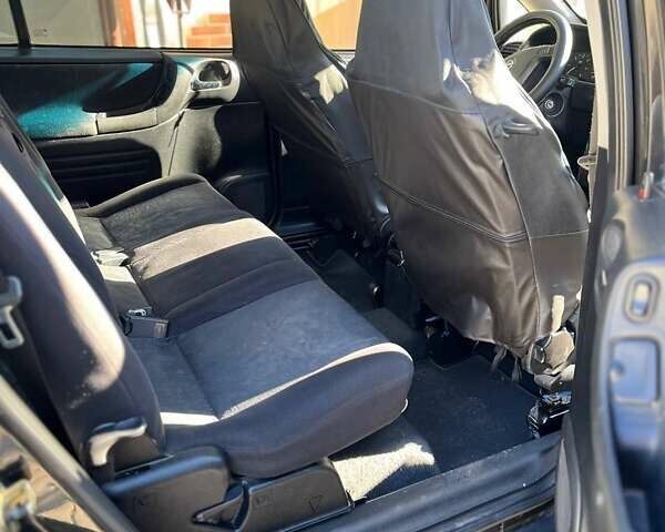 Черный Опель Зафира, объемом двигателя 2 л и пробегом 349 тыс. км за 3999 $, фото 11 на Automoto.ua