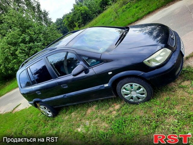 Черный Опель Зафира, объемом двигателя 1.8 л и пробегом 303 тыс. км за 2600 $, фото 5 на Automoto.ua