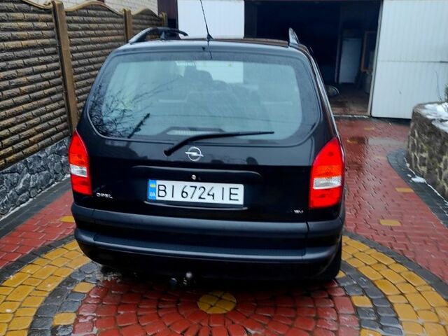 Чорний Опель Зафіра, об'ємом двигуна 1.8 л та пробігом 245 тис. км за 4000 $, фото 4 на Automoto.ua