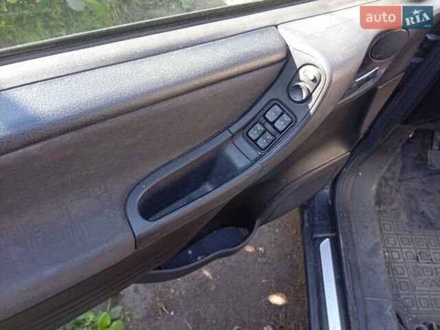 Черный Опель Зафира, объемом двигателя 1.8 л и пробегом 210 тыс. км за 4000 $, фото 4 на Automoto.ua