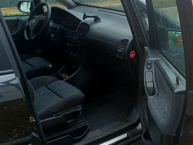 Черный Опель Зафира, объемом двигателя 1.8 л и пробегом 320 тыс. км за 3950 $, фото 7 на Automoto.ua