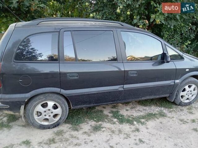 Черный Опель Зафира, объемом двигателя 1.8 л и пробегом 210 тыс. км за 4000 $, фото 7 на Automoto.ua