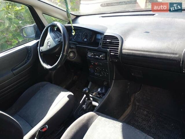 Черный Опель Зафира, объемом двигателя 1.8 л и пробегом 210 тыс. км за 4000 $, фото 2 на Automoto.ua