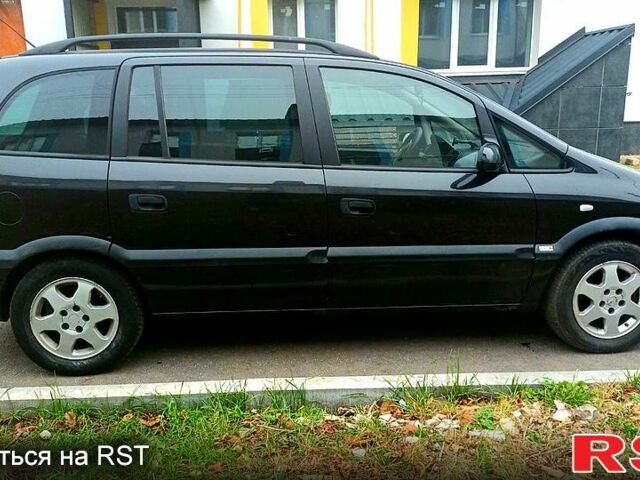 Черный Опель Зафира, объемом двигателя 1.8 л и пробегом 320 тыс. км за 3950 $, фото 1 на Automoto.ua