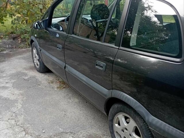 Чорний Опель Зафіра, об'ємом двигуна 2 л та пробігом 245 тис. км за 2613 $, фото 2 на Automoto.ua
