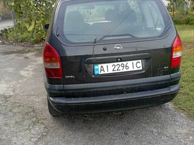 Чорний Опель Зафіра, об'ємом двигуна 2 л та пробігом 245 тис. км за 2613 $, фото 5 на Automoto.ua
