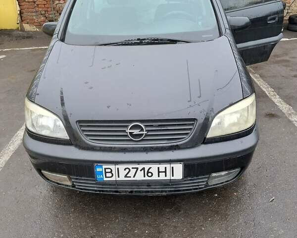 Черный Опель Зафира, объемом двигателя 2.17 л и пробегом 315 тыс. км за 3777 $, фото 1 на Automoto.ua