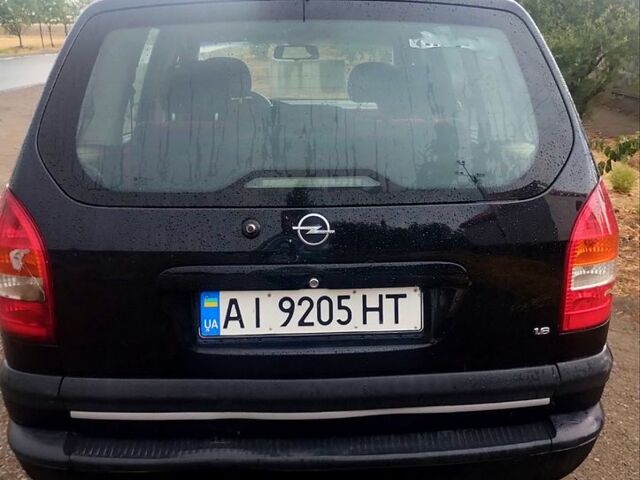 Черный Опель Зафира, объемом двигателя 1.6 л и пробегом 321 тыс. км за 3700 $, фото 4 на Automoto.ua
