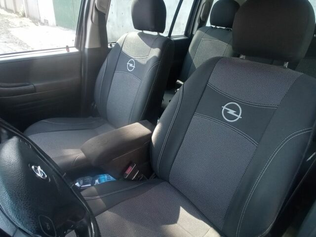 Черный Опель Зафира, объемом двигателя 2 л и пробегом 443 тыс. км за 2700 $, фото 9 на Automoto.ua