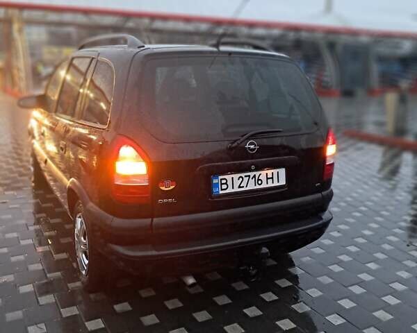 Черный Опель Зафира, объемом двигателя 2.17 л и пробегом 315 тыс. км за 3777 $, фото 2 на Automoto.ua