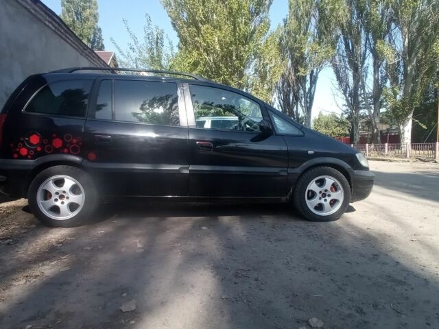 Черный Опель Зафира, объемом двигателя 2 л и пробегом 443 тыс. км за 2700 $, фото 2 на Automoto.ua