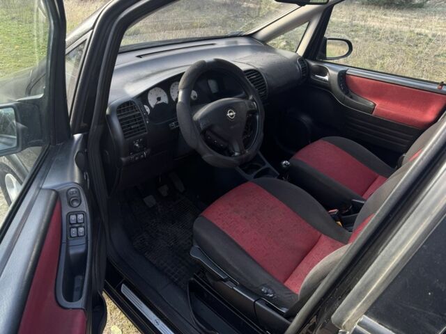 Черный Опель Зафира, объемом двигателя 2 л и пробегом 230 тыс. км за 1800 $, фото 4 на Automoto.ua