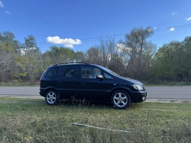 Черный Опель Зафира, объемом двигателя 2 л и пробегом 230 тыс. км за 1800 $, фото 3 на Automoto.ua