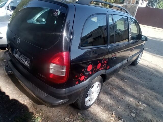 Черный Опель Зафира, объемом двигателя 2 л и пробегом 443 тыс. км за 2700 $, фото 1 на Automoto.ua