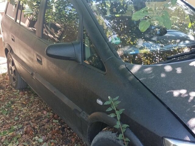 Черный Опель Зафира, объемом двигателя 1.8 л и пробегом 250 тыс. км за 1100 $, фото 7 на Automoto.ua