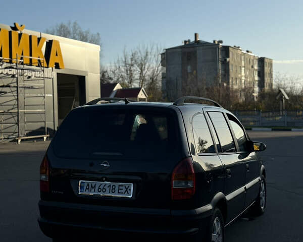 Чорний Опель Зафіра, об'ємом двигуна 2.2 л та пробігом 343 тис. км за 2299 $, фото 4 на Automoto.ua