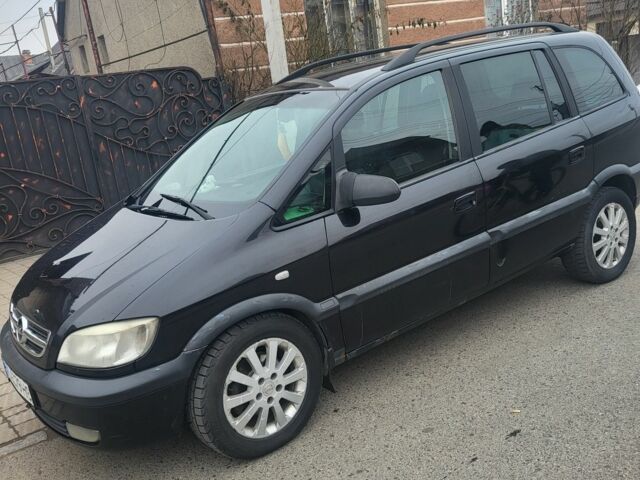 Черный Опель Зафира, объемом двигателя 2 л и пробегом 450 тыс. км за 3700 $, фото 2 на Automoto.ua