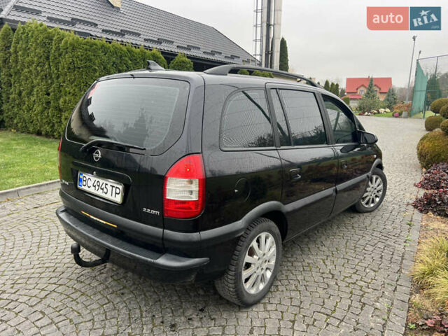 Черный Опель Зафира, объемом двигателя 2.17 л и пробегом 299 тыс. км за 2649 $, фото 5 на Automoto.ua