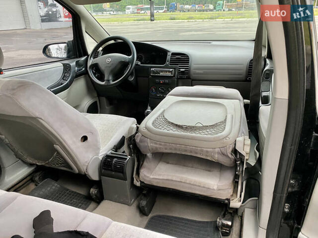 Чорний Опель Зафіра, об'ємом двигуна 2 л та пробігом 250 тис. км за 2999 $, фото 24 на Automoto.ua