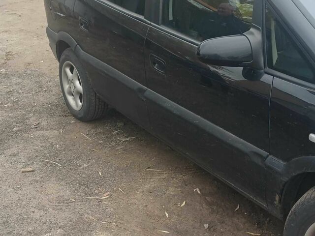 Черный Опель Зафира, объемом двигателя 2.2 л и пробегом 260 тыс. км за 2200 $, фото 6 на Automoto.ua