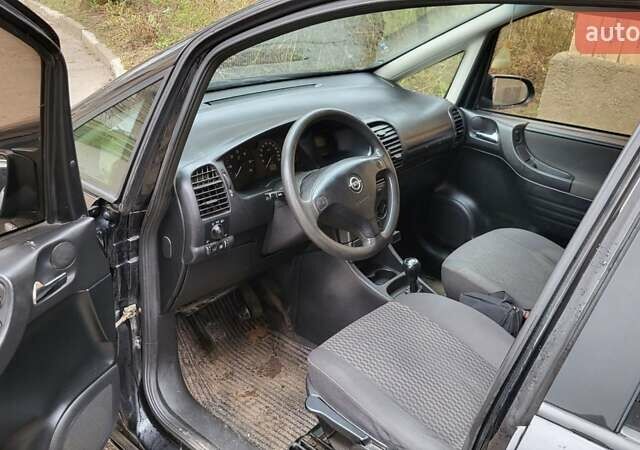 Черный Опель Зафира, объемом двигателя 2 л и пробегом 310 тыс. км за 3500 $, фото 5 на Automoto.ua