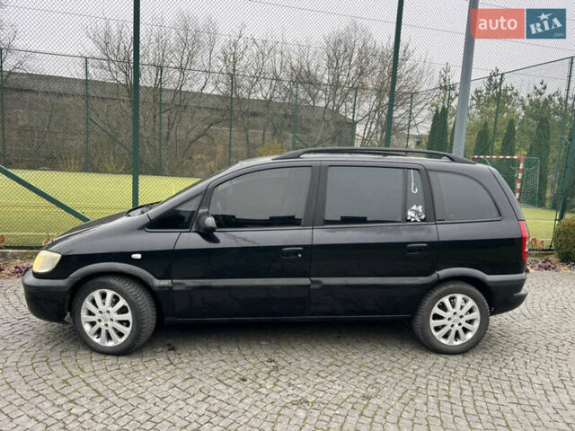 Черный Опель Зафира, объемом двигателя 2.17 л и пробегом 299 тыс. км за 2649 $, фото 2 на Automoto.ua