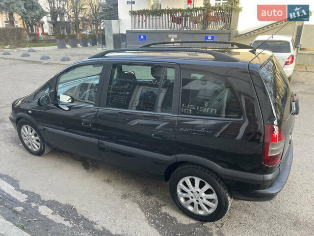 Черный Опель Зафира, объемом двигателя 2 л и пробегом 400 тыс. км за 4000 $, фото 3 на Automoto.ua