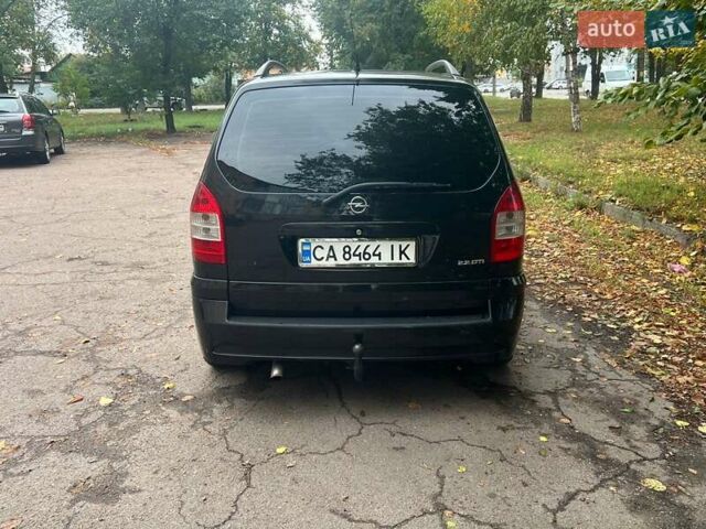 Опель Зафіра 2003 у Черкасах на Automoto.ua Чорний Опель Зафіра, об'ємом двигуна 2.17 л та пробігом 154 тис. км за 4400 $, фото 14 на Automoto.ua