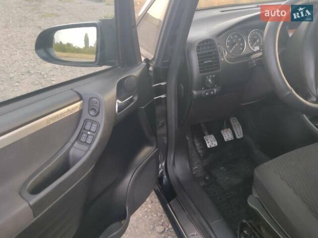 Чорний Опель Зафіра, об'ємом двигуна 1.8 л та пробігом 216 тис. км за 4900 $, фото 6 на Automoto.ua