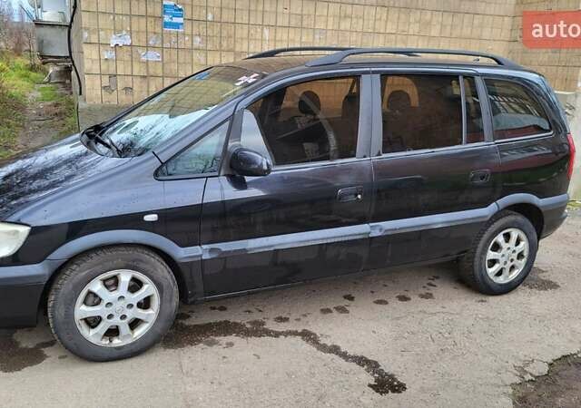 Черный Опель Зафира, объемом двигателя 2 л и пробегом 310 тыс. км за 3500 $, фото 2 на Automoto.ua