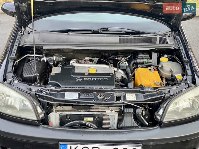 Чорний Опель Зафіра, об'ємом двигуна 2 л та пробігом 250 тис. км за 2999 $, фото 31 на Automoto.ua