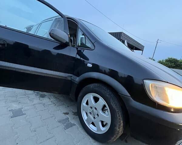 Чорний Опель Зафіра, об'ємом двигуна 2 л та пробігом 296 тис. км за 3600 $, фото 10 на Automoto.ua