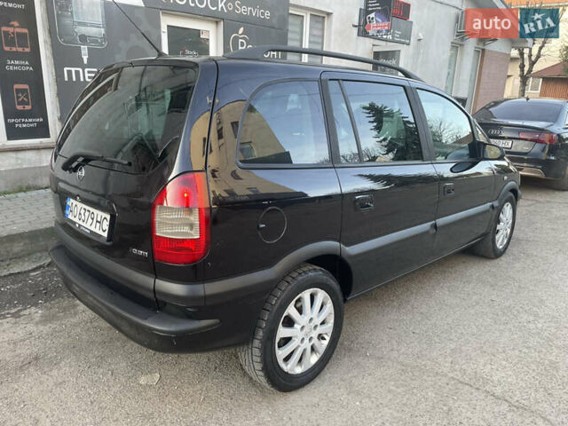 Черный Опель Зафира, объемом двигателя 2 л и пробегом 400 тыс. км за 4000 $, фото 2 на Automoto.ua