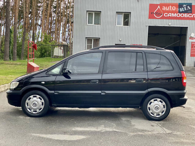 Чорний Опель Зафіра, об'ємом двигуна 2 л та пробігом 250 тис. км за 2999 $, фото 33 на Automoto.ua