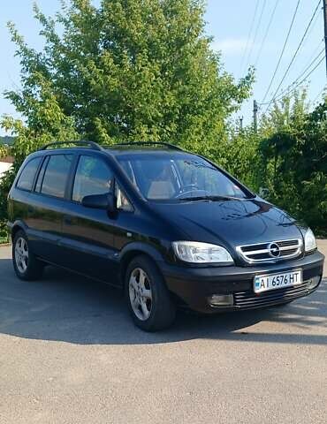 Черный Опель Зафира, объемом двигателя 2.2 л и пробегом 236 тыс. км за 3700 $, фото 2 на Automoto.ua