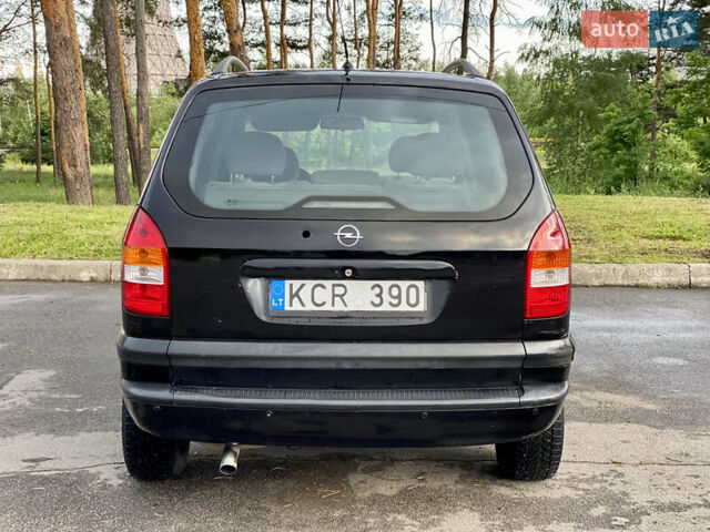 Чорний Опель Зафіра, об'ємом двигуна 2 л та пробігом 250 тис. км за 2999 $, фото 35 на Automoto.ua
