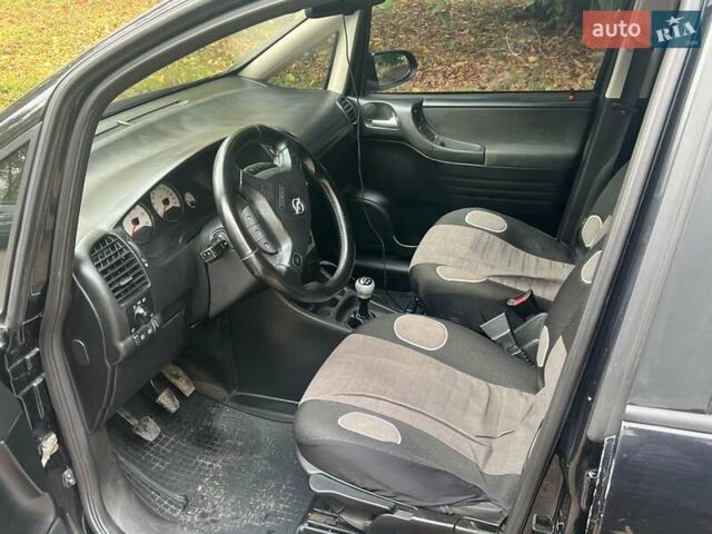 Опель Зафіра 2003 у Черкасах на Automoto.ua Чорний Опель Зафіра, об'ємом двигуна 2.17 л та пробігом 154 тис. км за 4400 $, фото 10 на Automoto.ua