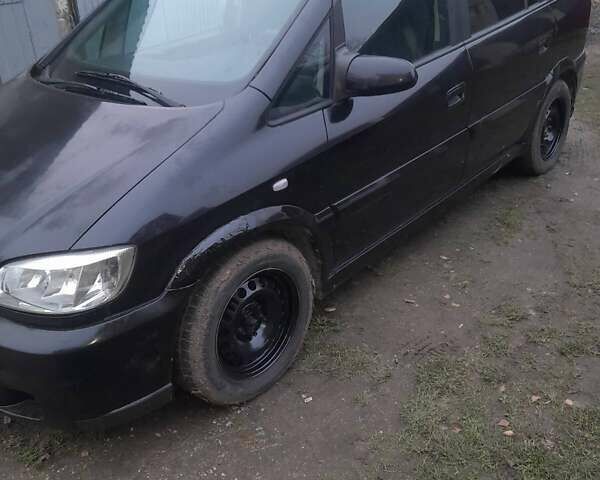 Черный Опель Зафира, объемом двигателя 2 л и пробегом 300 тыс. км за 4100 $, фото 12 на Automoto.ua